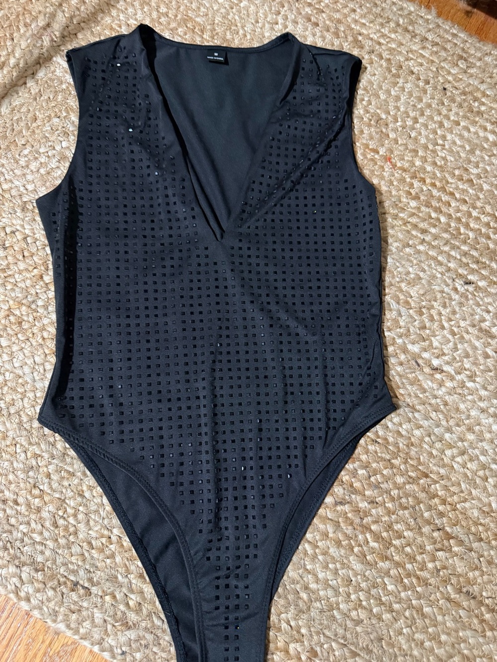 Black Sleeveless V-Neck Bodysuit with Laser-Cut Detail